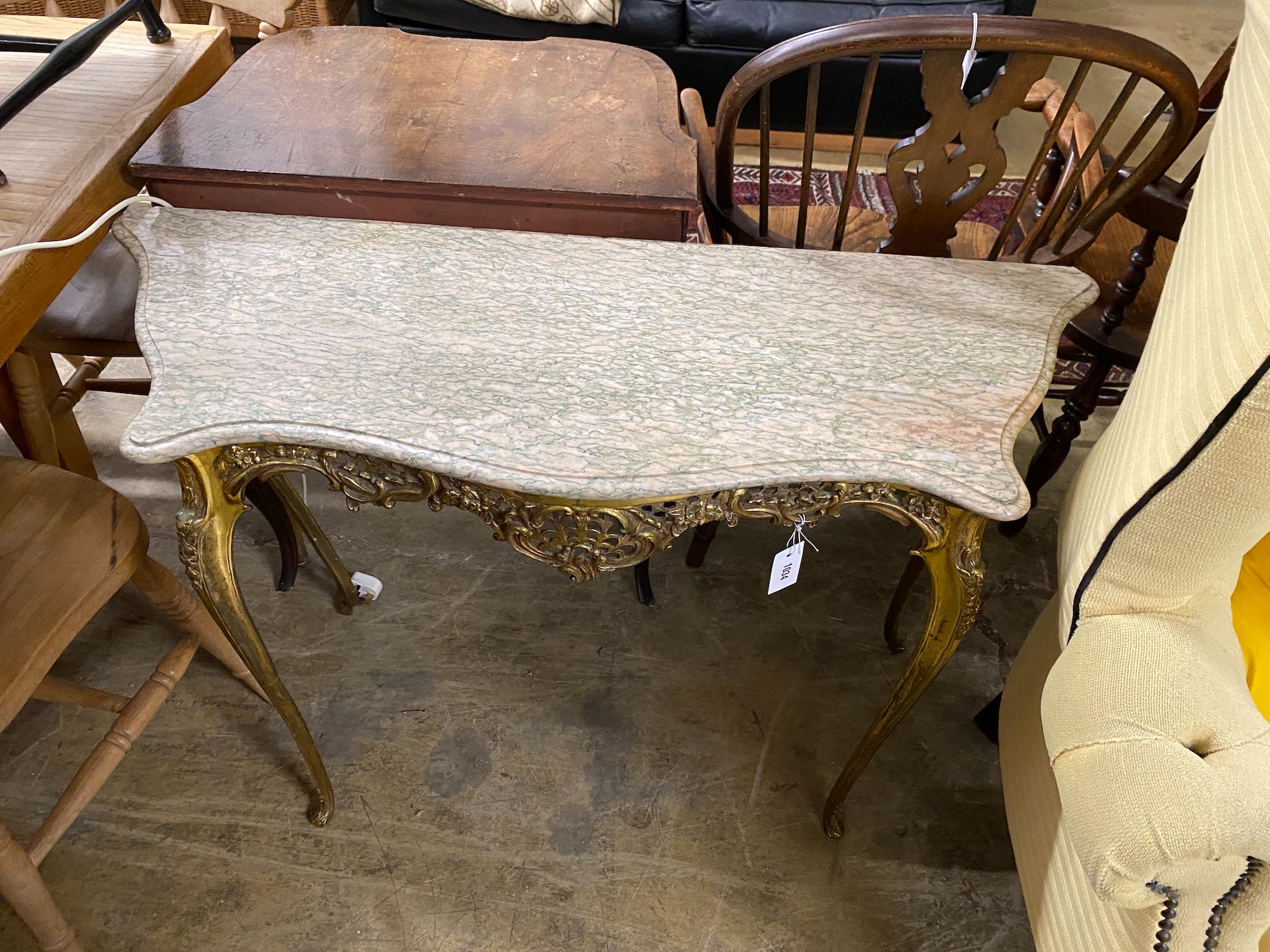A cast brass console table with serpentine marble top, width 110cm, height 74cm